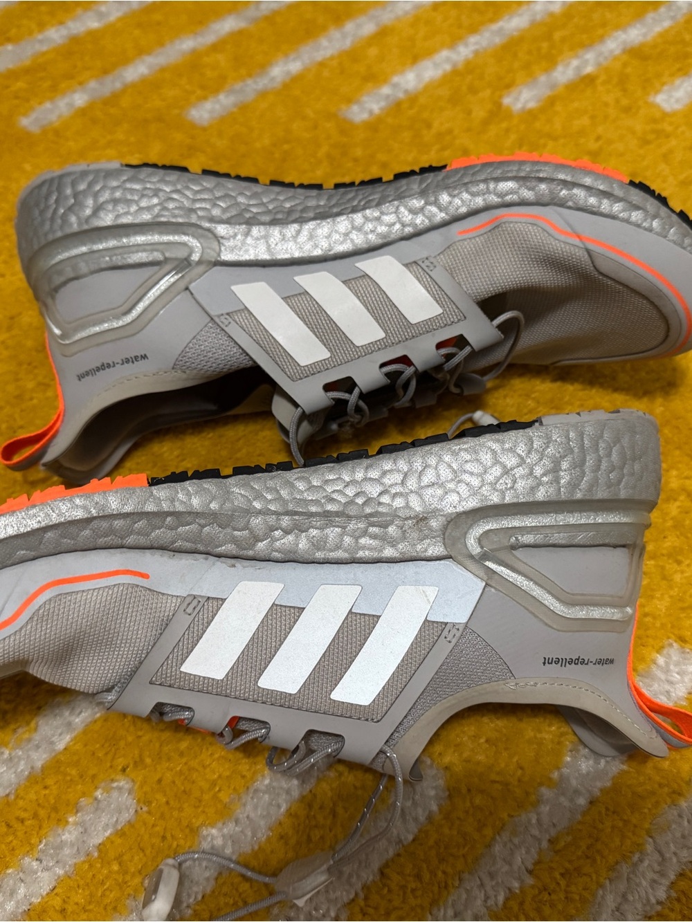 adidas Grey and Silver WATER REPELLENT sneakers with Neon Orange Trim